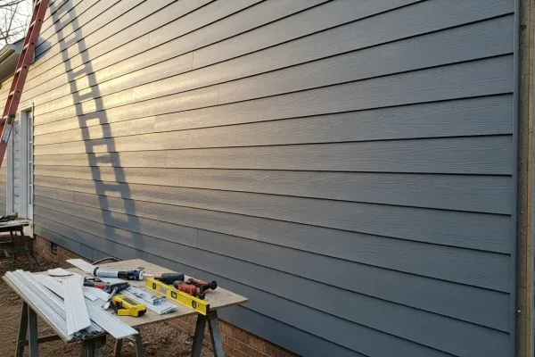New siding installed on residential home exterior